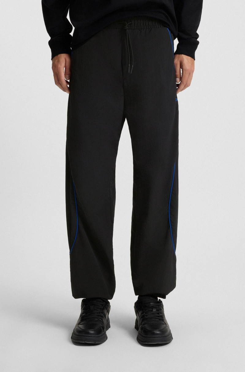 WATER-REPELLENT TROUSERS WITH LOGO AND PIPING 4