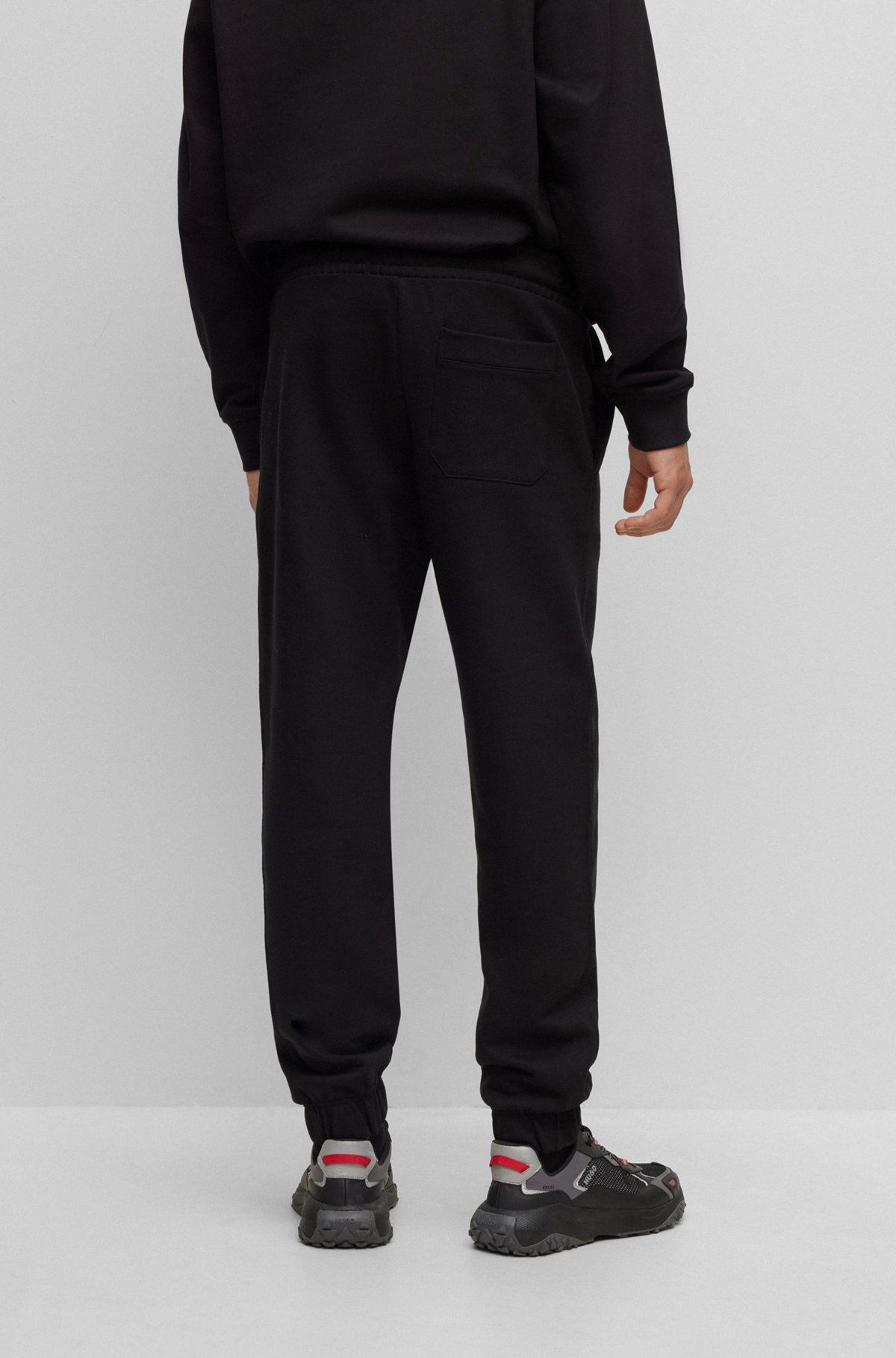 RELAXED-FIT COTTON-TERRY TRACKSUIT BOTTOMS WITH STACKED LOGO - 5