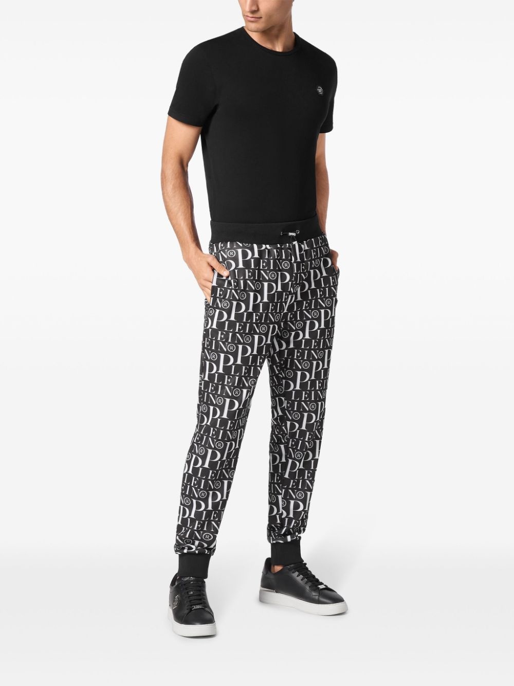 all-over logo-print track pants - 2