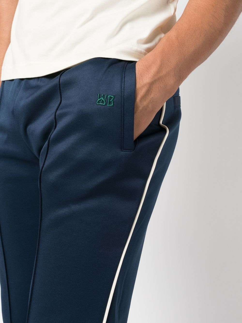 Kola logo-embroidered panelled track pants - 5
