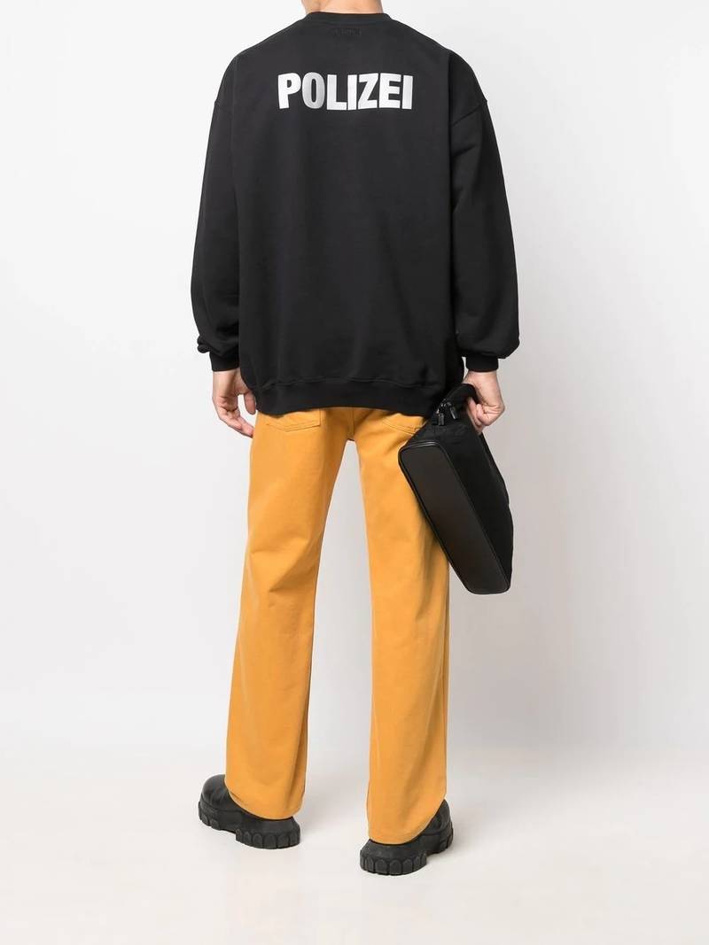 VETEMENTS slogan-print crew neck sweatshirt outlook