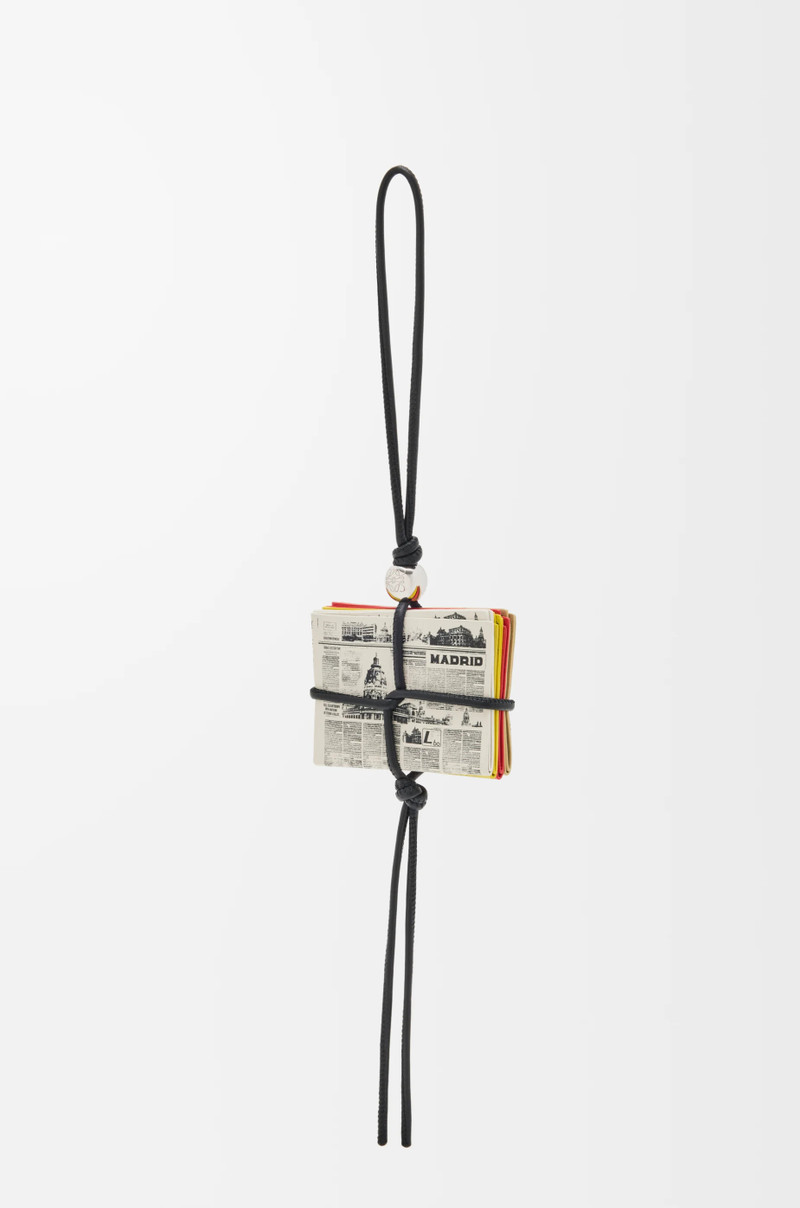 Newspaper charm in calfskin 1