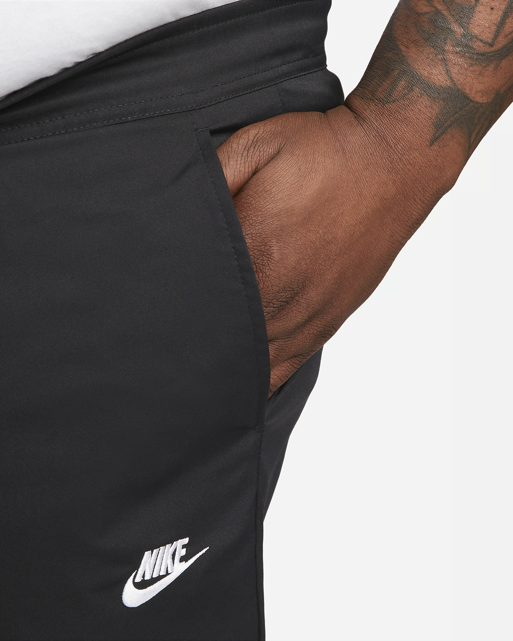 Nike Club Men's Woven Tapered Leg Pants - 9