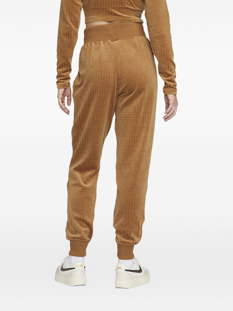 Nike high-waisted velour trousers outlook