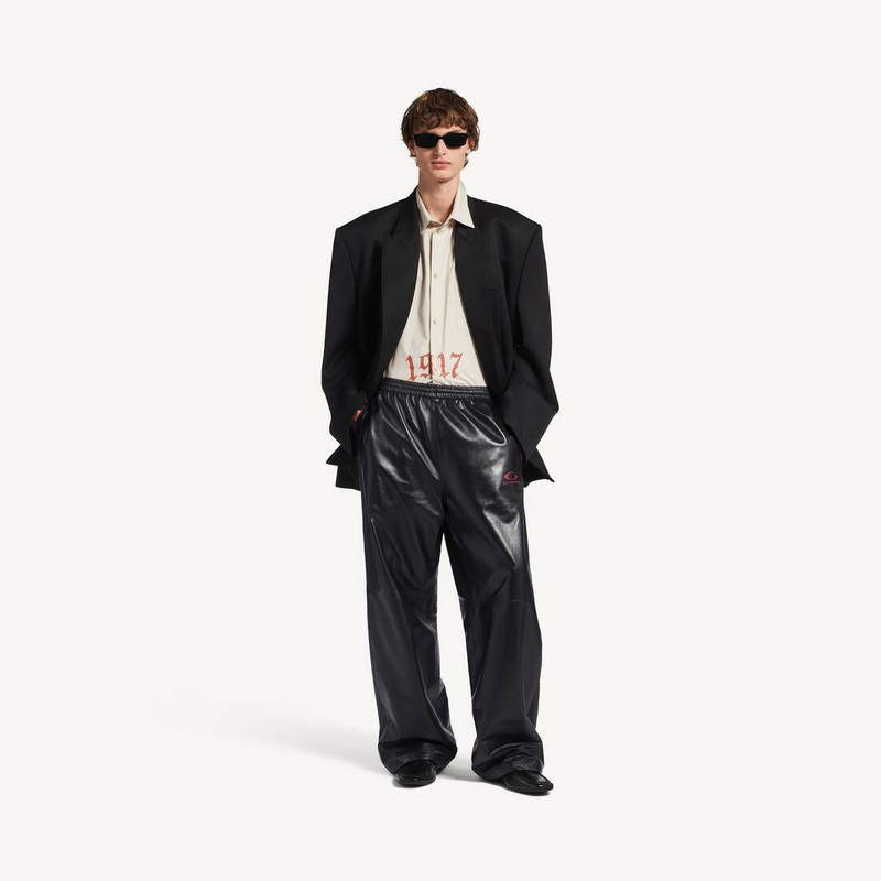 BALENCIAGA Men's Tracksuit Pants in Black/burgundy outlook