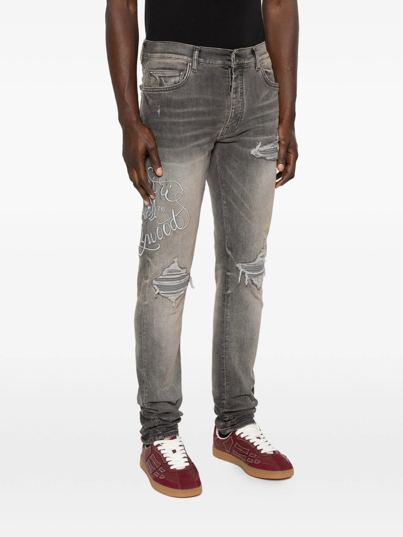 Amiri Ripped Embroidery Jeans 5