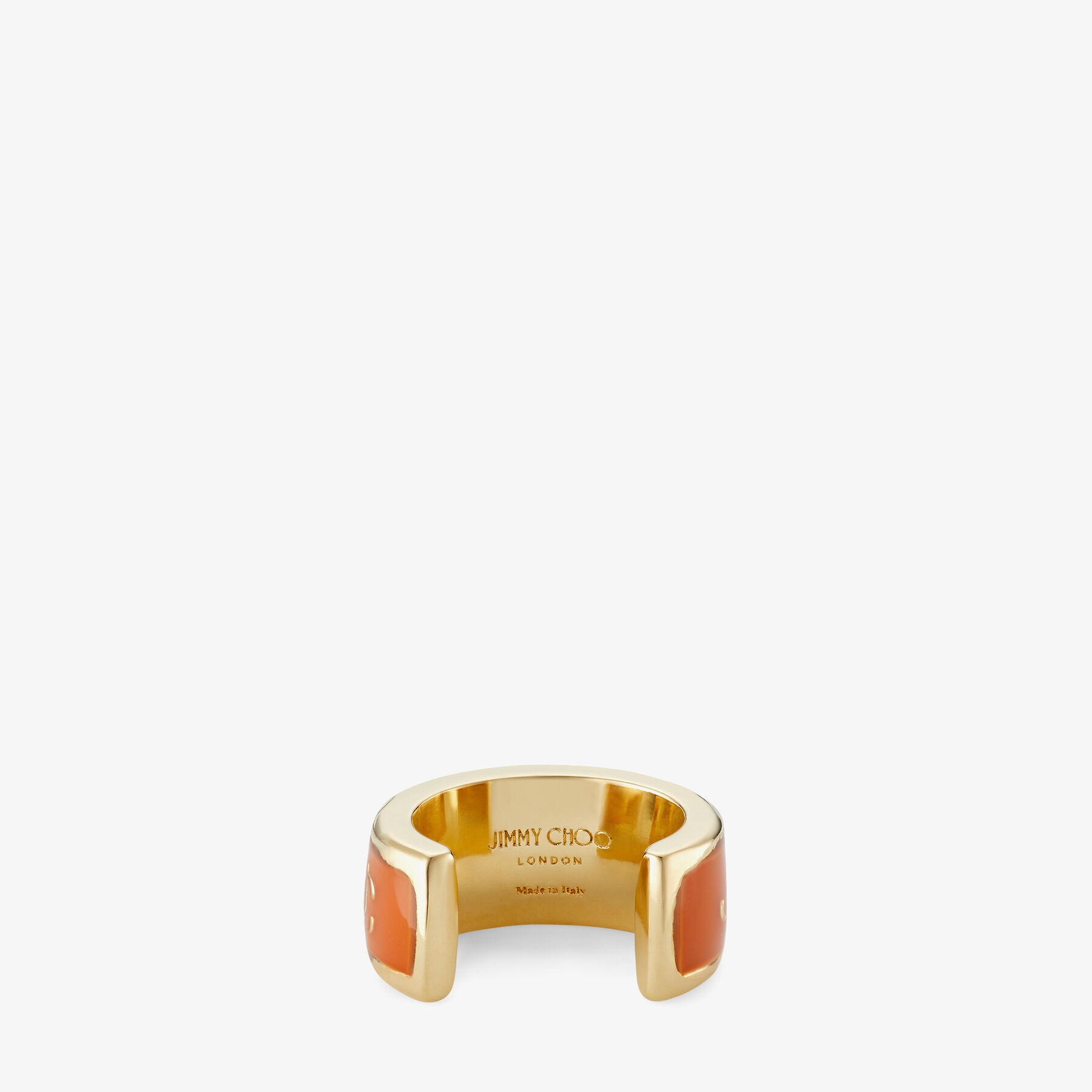 Single JC Ear Cuff
Gold-Finish Metal and Amber Orange Enamel JC Ear Cuff - 6