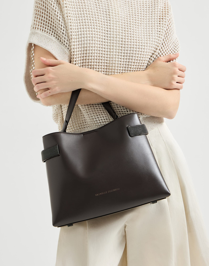 Essence top-handle bag in calfskin with precious bands 4