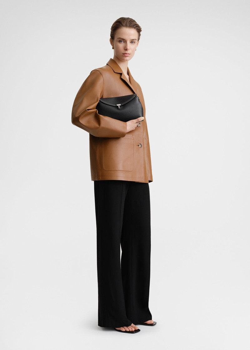 Totême T-Lock clutch black grain outlook