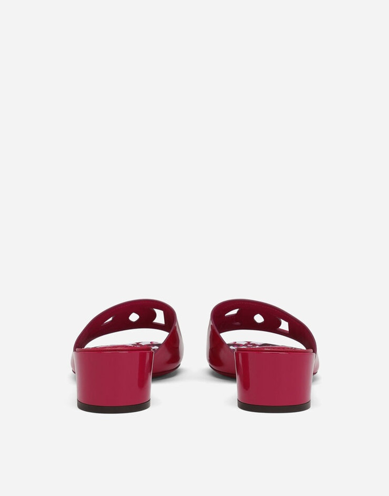 Dolce & Gabbana Patent leather DG mules with cut-out outlook