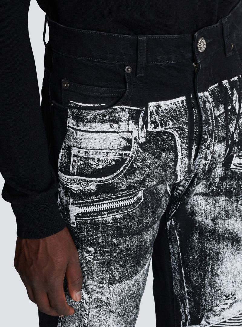 Loose-fit denim jeans with a biker print 8
