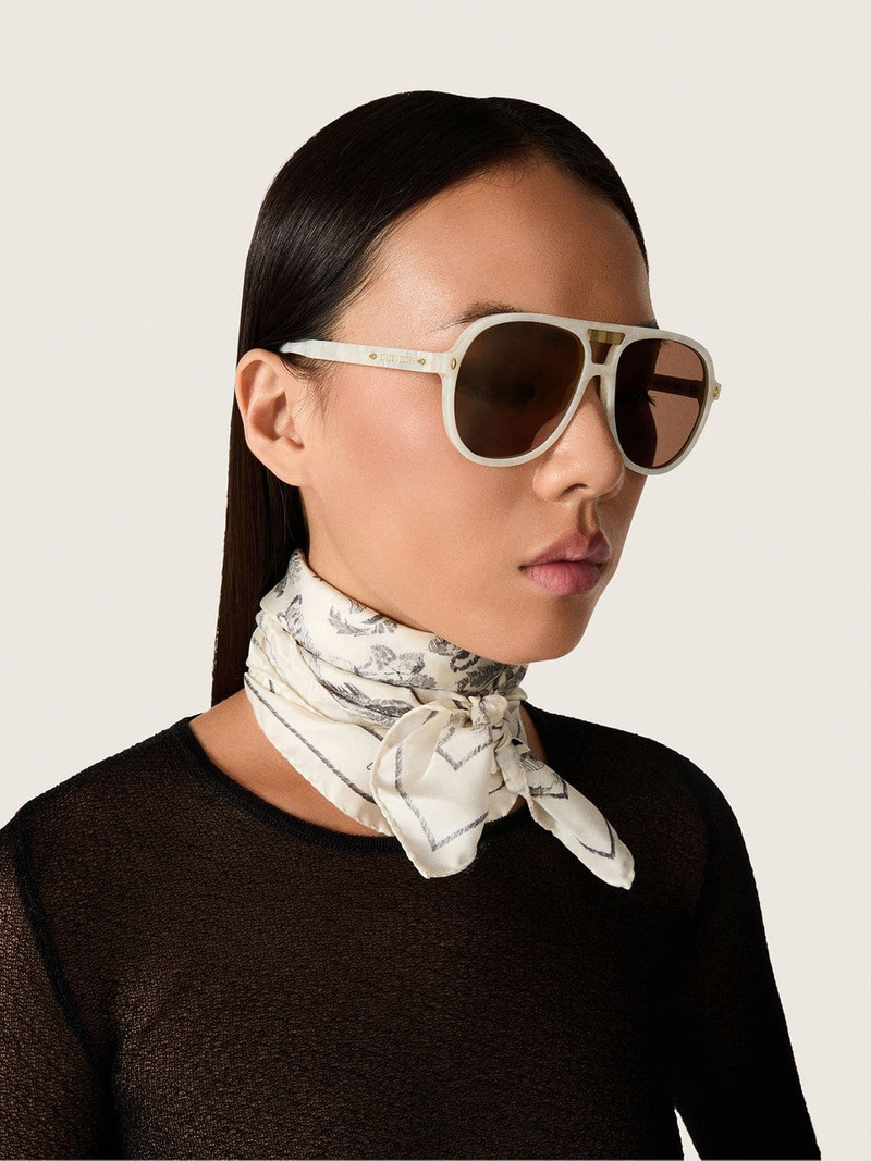 Golden Goose Charlie aviator sunglasses with pearl white frame and gold lenses outlook