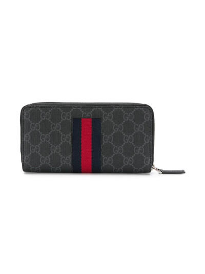 GUCCI black GG Supreme Web zip around wallet outlook