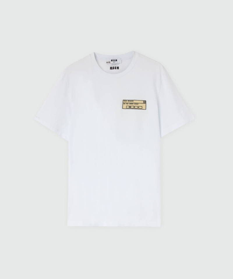 White long-sleeve cotton jersey T-shirt with patch on the chest. 1