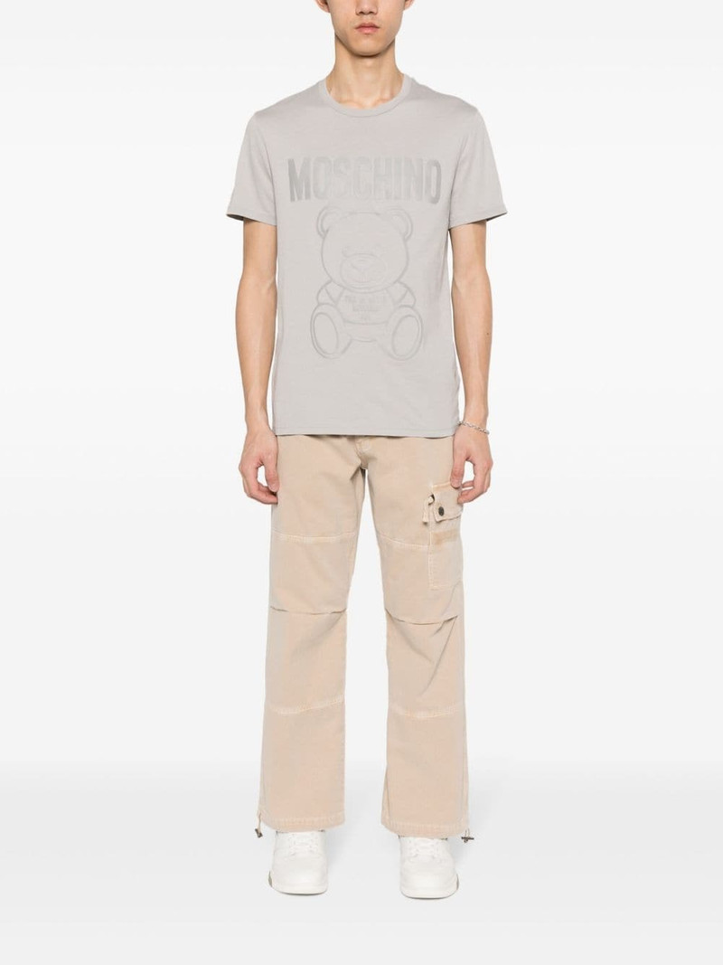 Moschino logo-embroidered cotton trousers outlook
