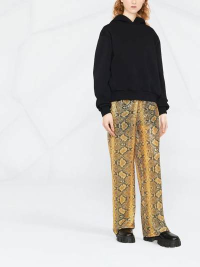 GCDS sequin-embellished snakeskin-print trousers outlook