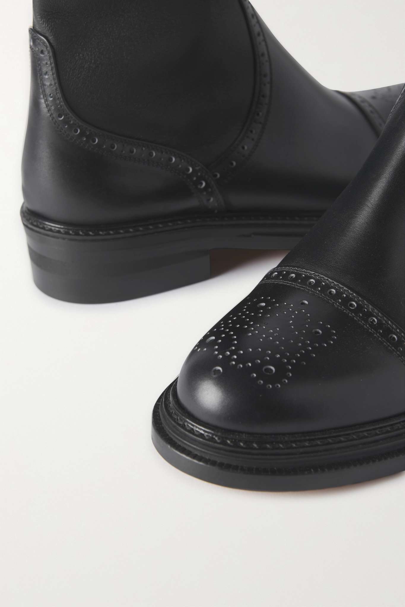 Logo-perforated stretch-leather ankle boots - 4