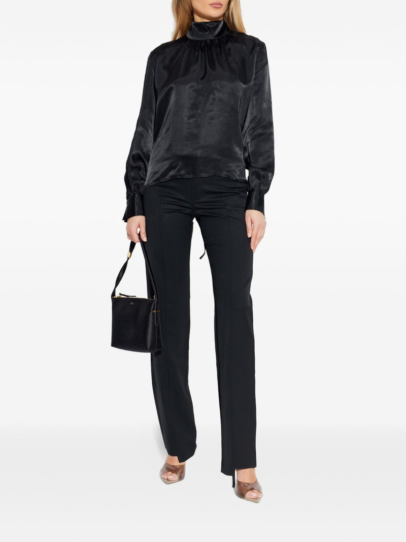 VETEMENTS open-back turtleneck top outlook