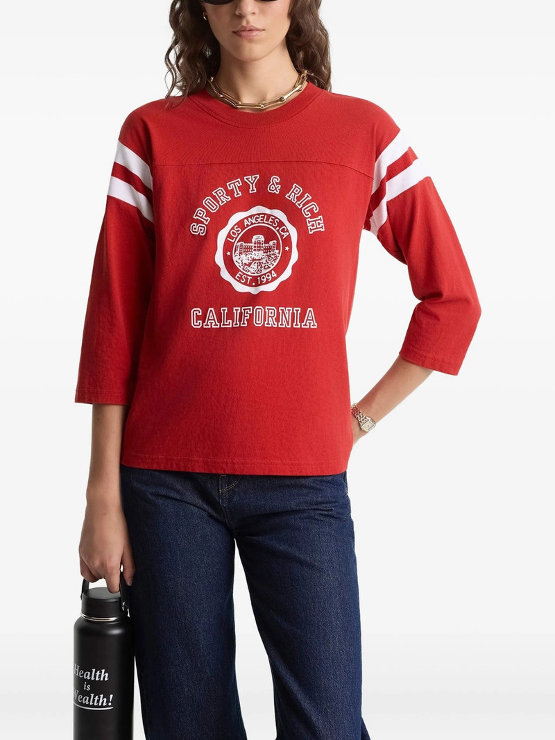 Sporty & Rich Striped Graphic Top 5