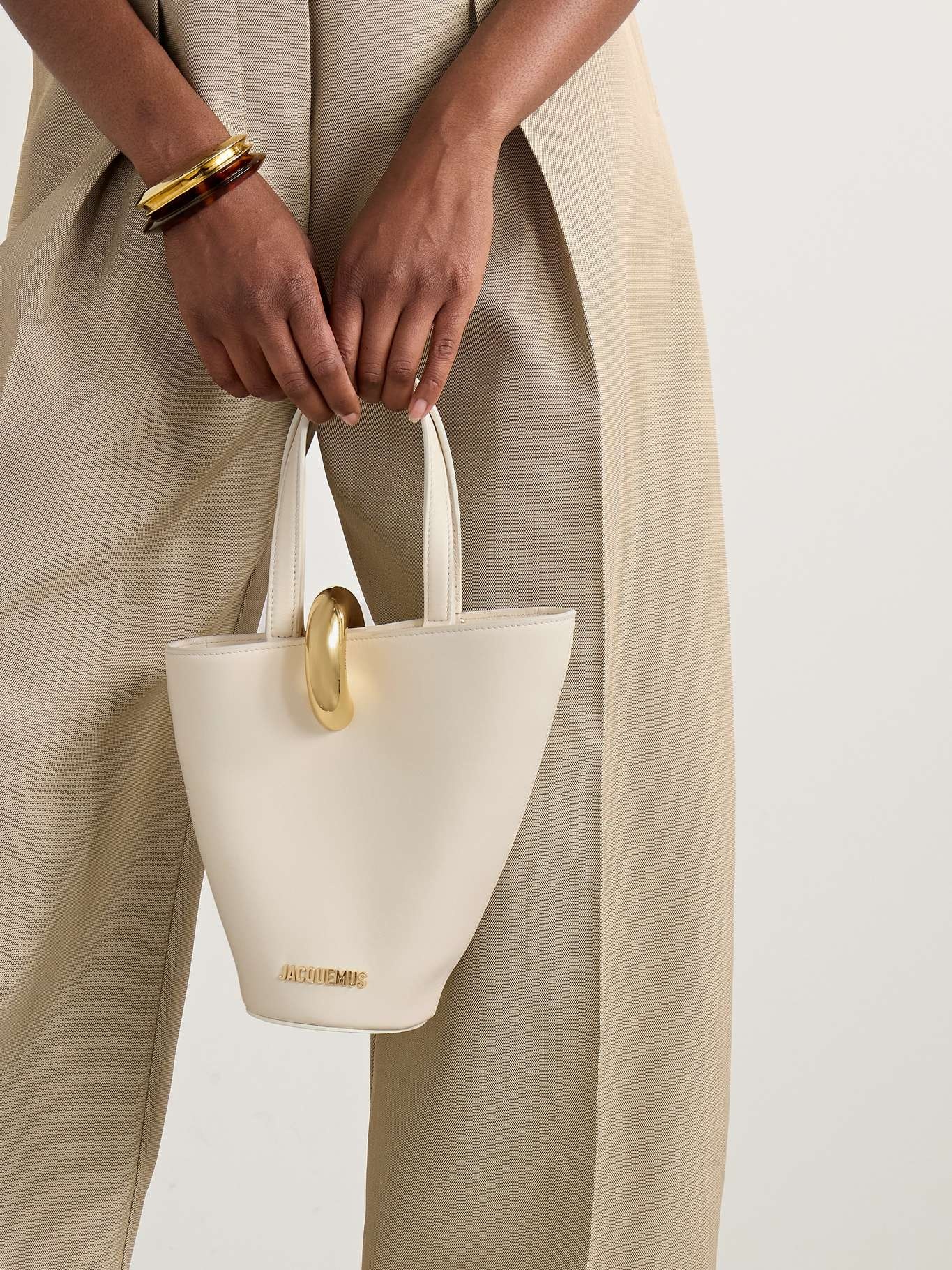 JACQUEMUS Le Petit Bambola embellished asymmetric leather