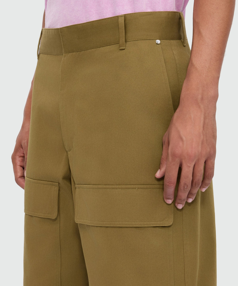 Military green cotton gabardine Bermuda shorts with wide legs and patch pockets on the leg. 5