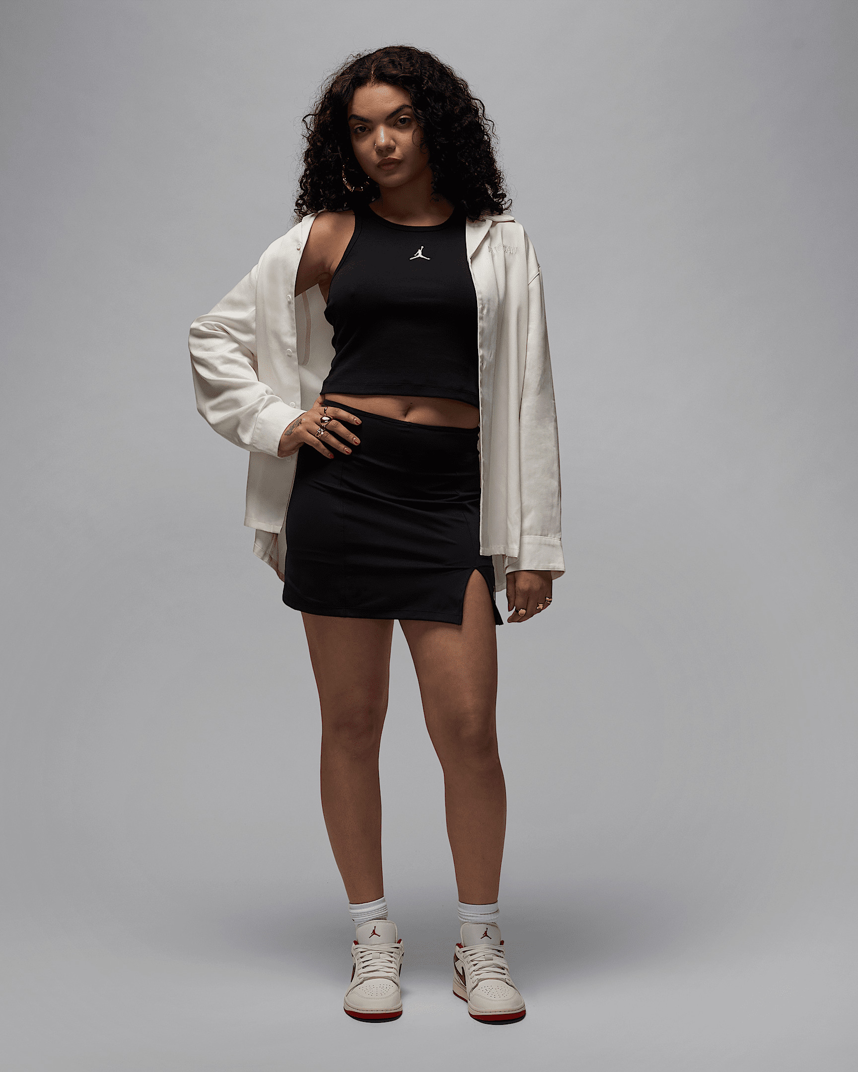 Air Jordan Women's Long-Sleeve Woven Top - 6