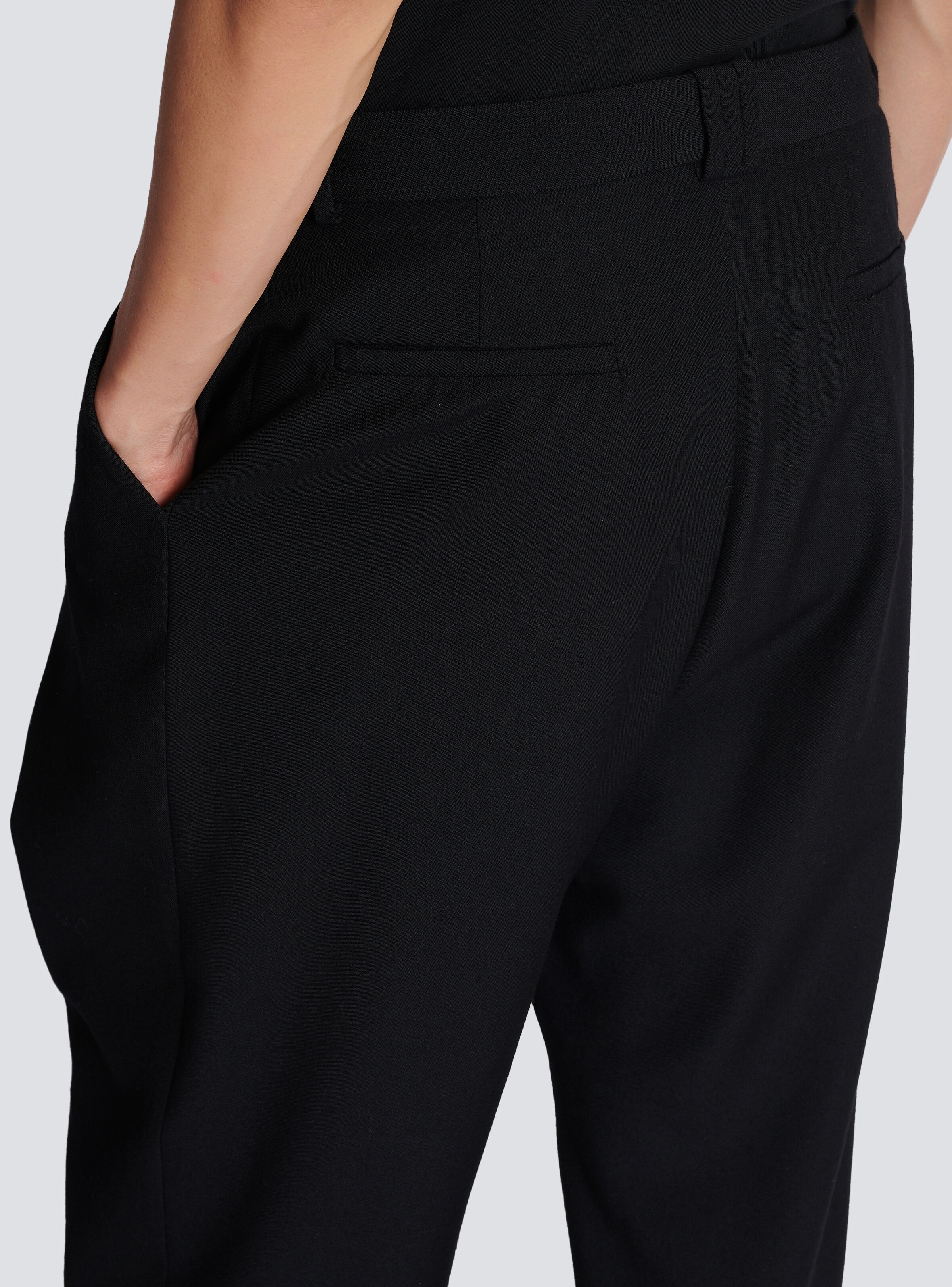 Wool trousers with pleated hem - 7