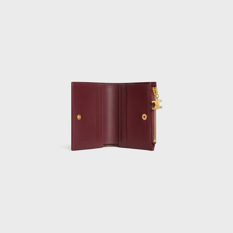 CELINE COMPACT WALLET TRIOMPHE CHARMS IN GRAINED CALFSKIN outlook