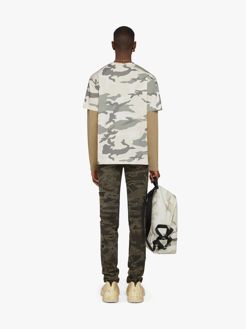 SLIM-FIT IN DESTROYED DENIM WITH PRINTED CAMO 4