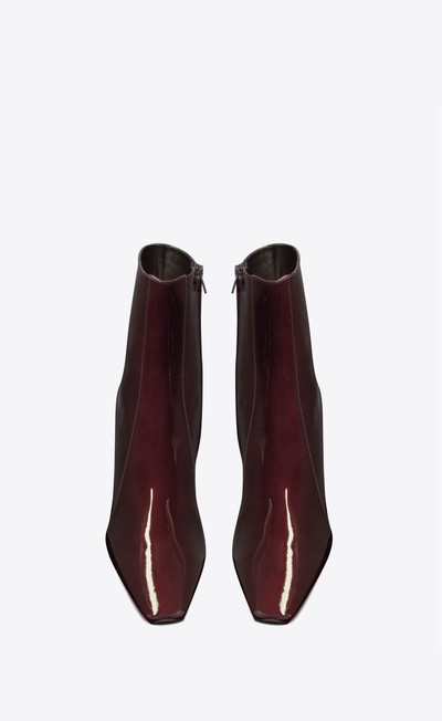 SAINT LAURENT rainer zipped boots in patent leather outlook