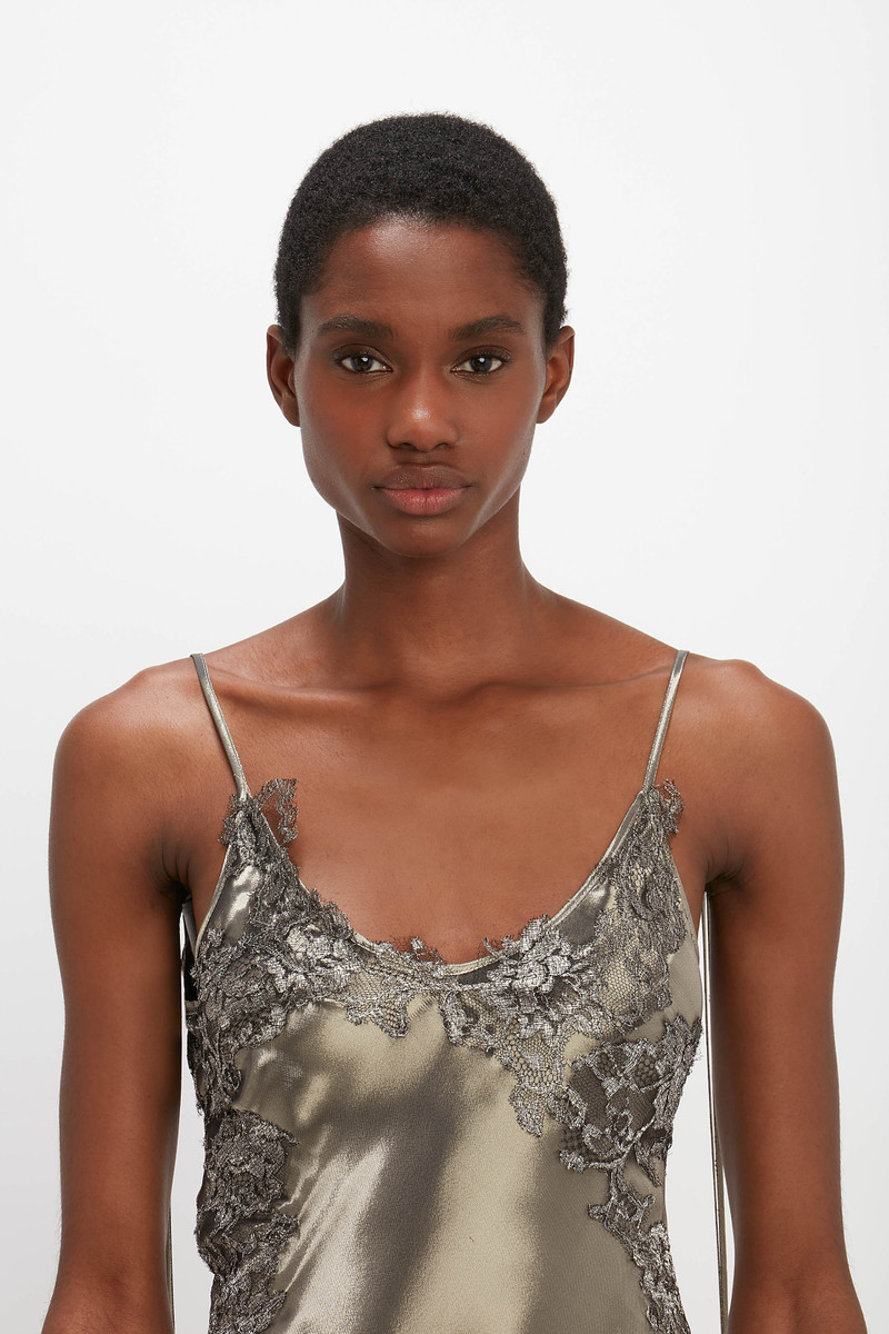 victoria beckham liquid metallic dress The Victoria Beckham exclusive Liquid Metallic Evening Gowns echo the  glamour of 40s Hollywood, but with the boldness of the 70s club scene. ,  Shop the Liquid Metallic Evening Gowns in shimmering
