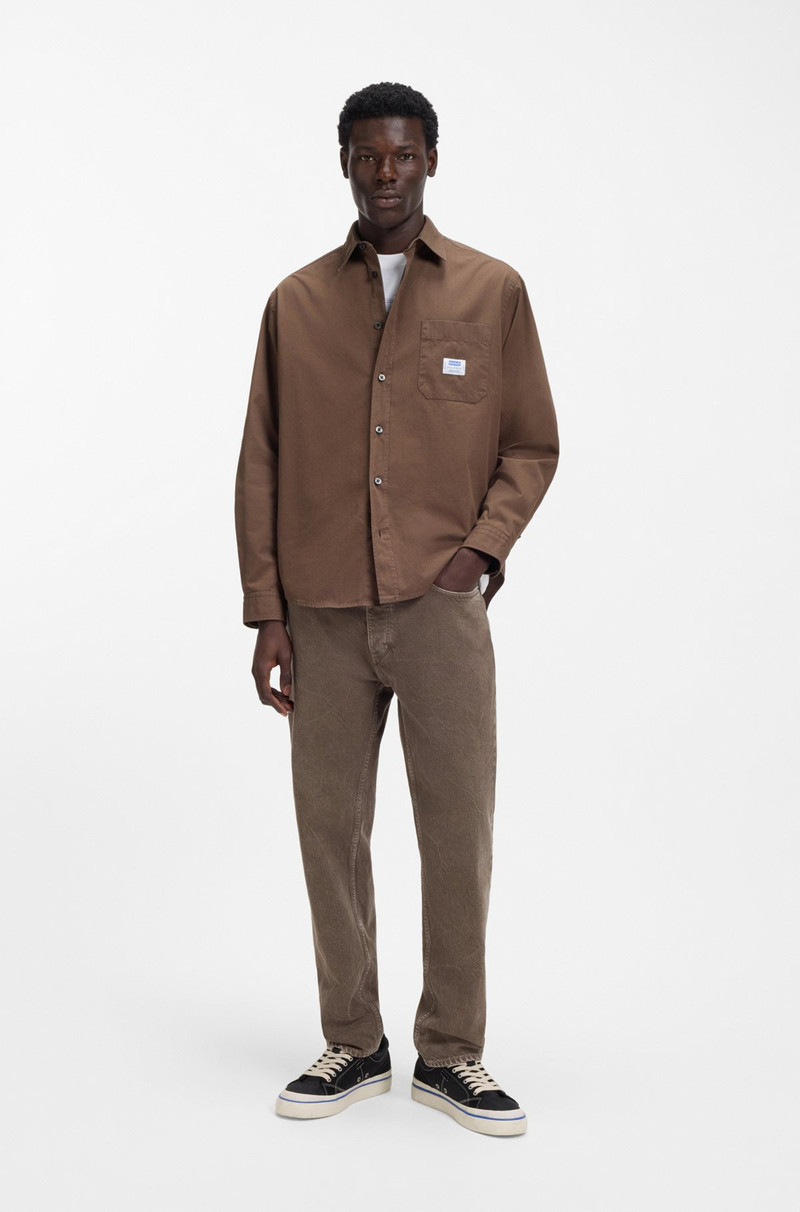 HUGO REGULAR-FIT JEANS IN WASHED DENIM outlook