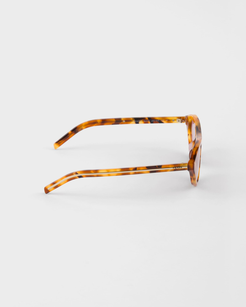 상징 금속 plaque를 가진 Prada sunglasses 4