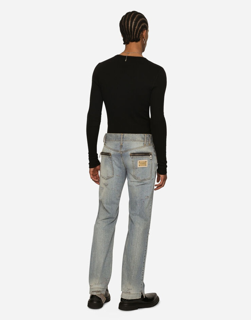 Washed denim jeans with rips 3