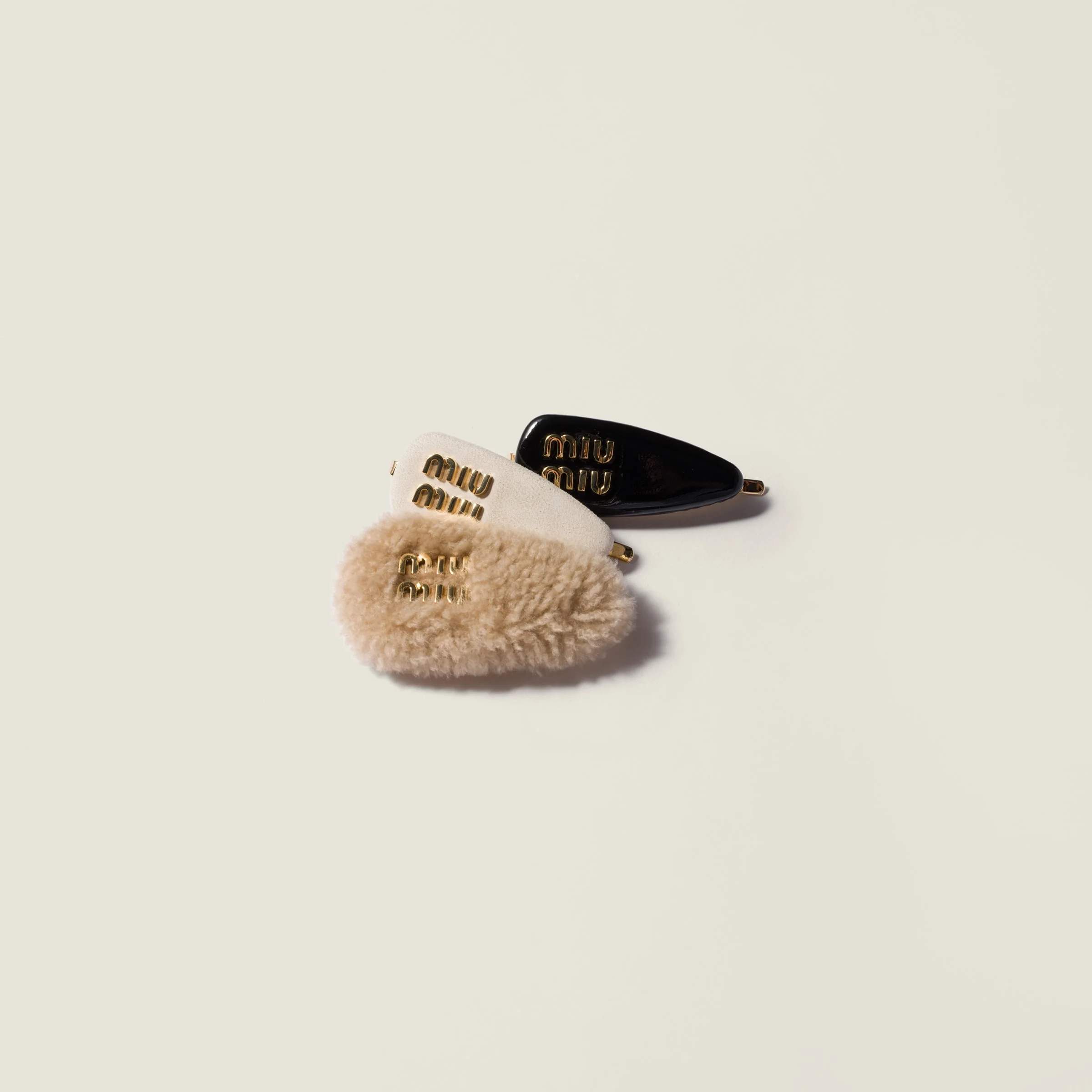 Set of leather, suede, and shearling hair clips - 1