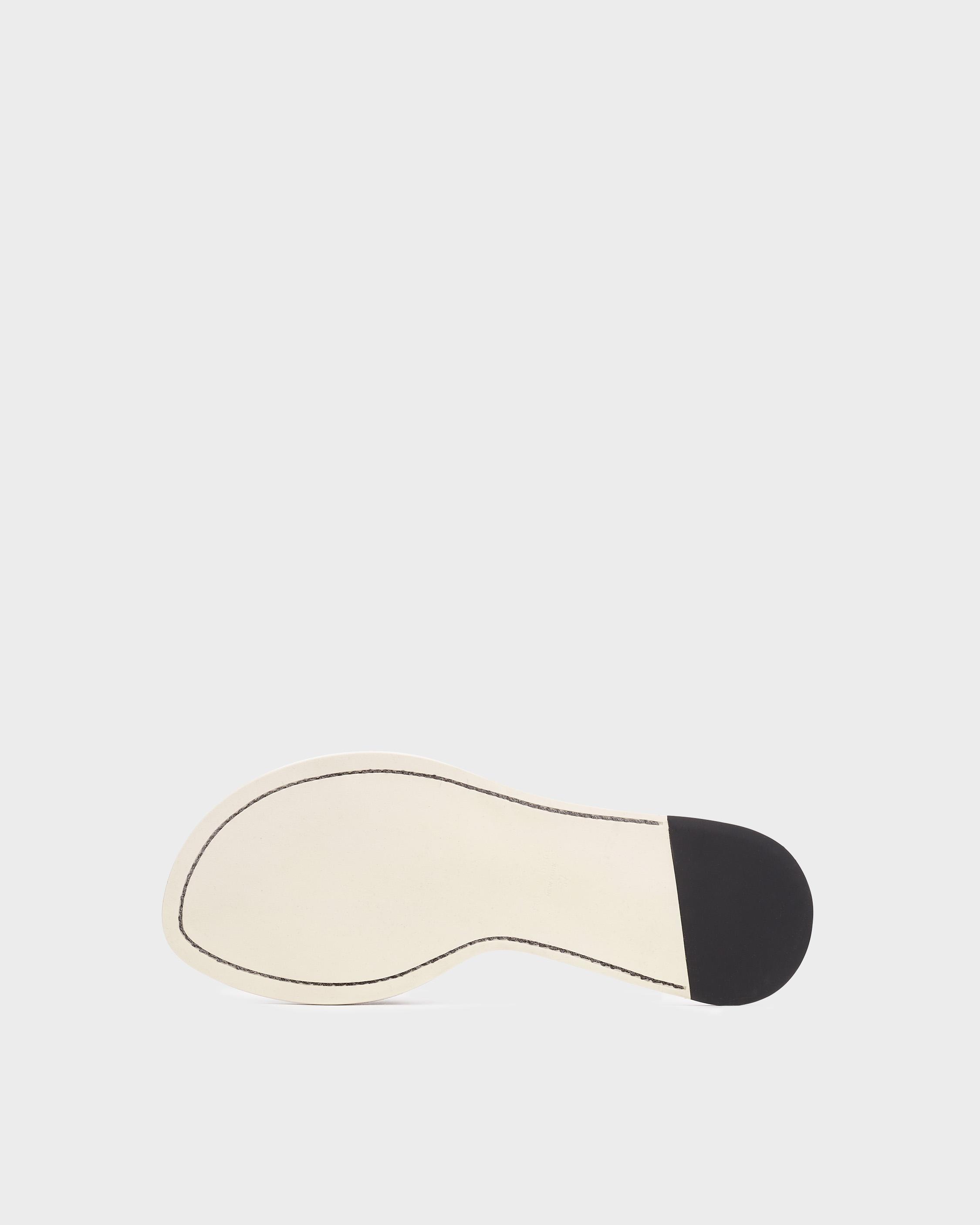 Melrose Slide - Recycled Materials
Flat Sandal - 4