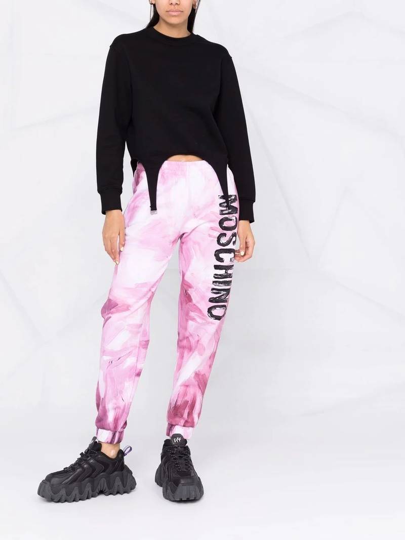 Moschino abstract-print branded track trousers outlook