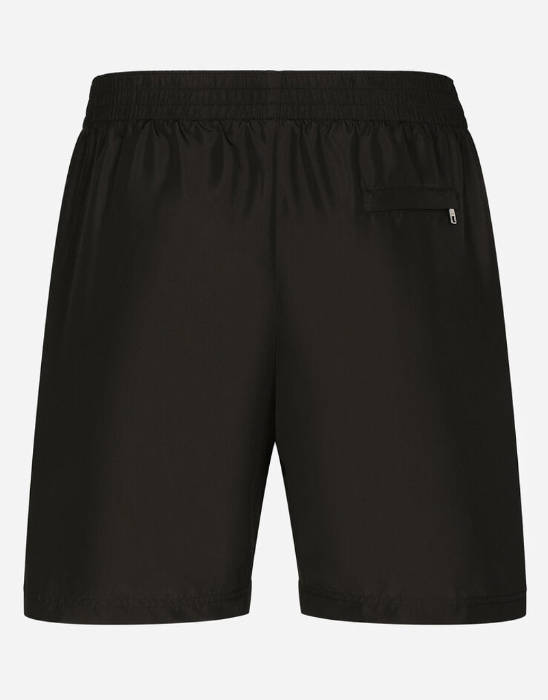 Dolce & Gabbana Mid-length swim trunks with logo tag outlook