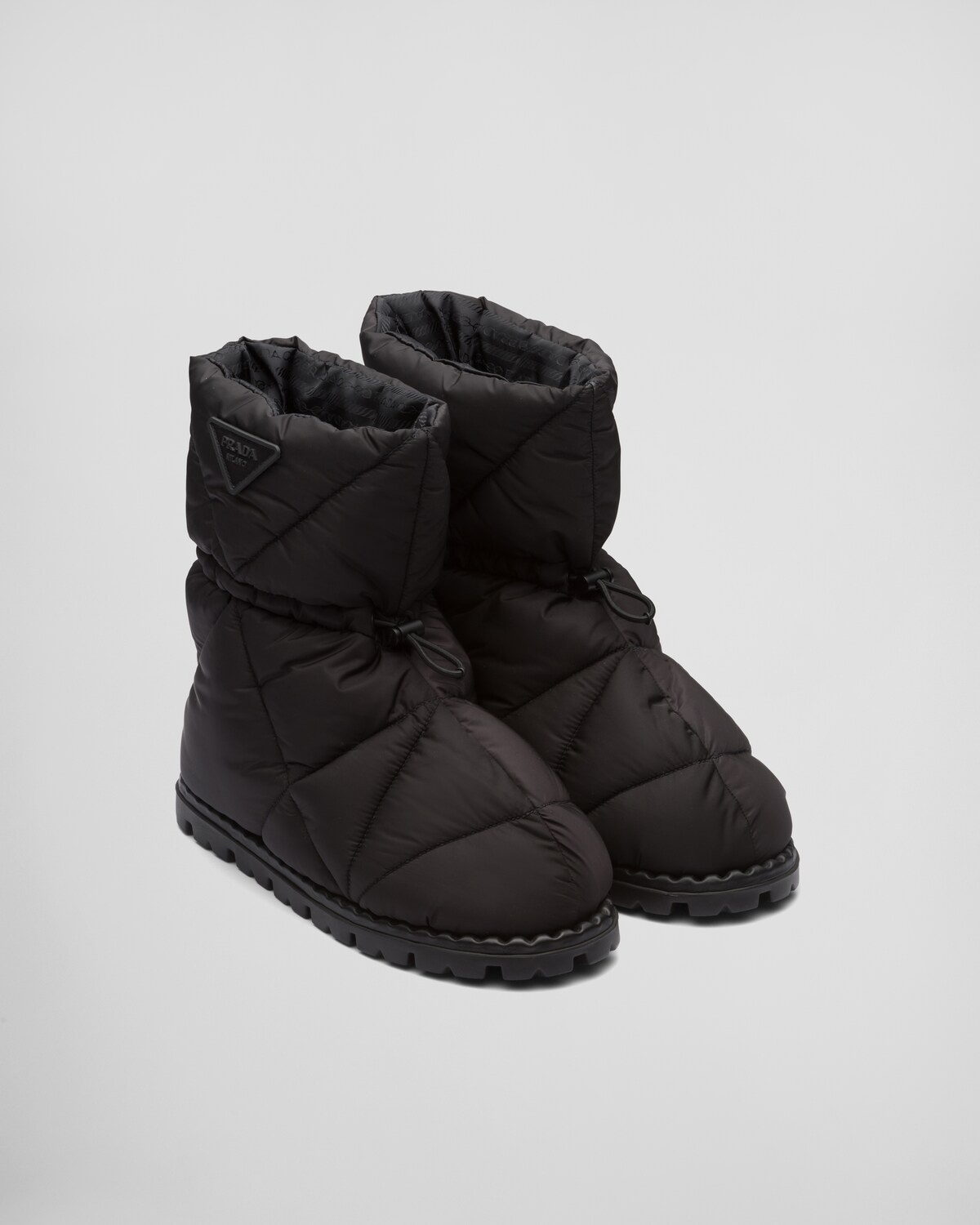 Quilted nylon fabric booties - 1