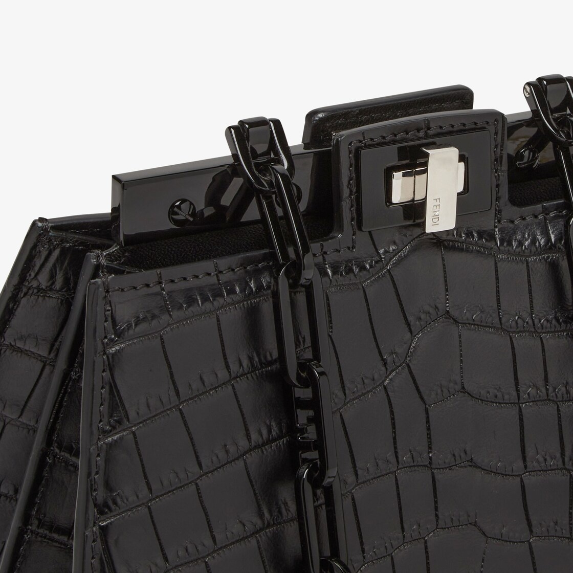 Compact Peekaboo Cut bag made of exquisite matt black crocodile leather. A new evolution of the Peek 5