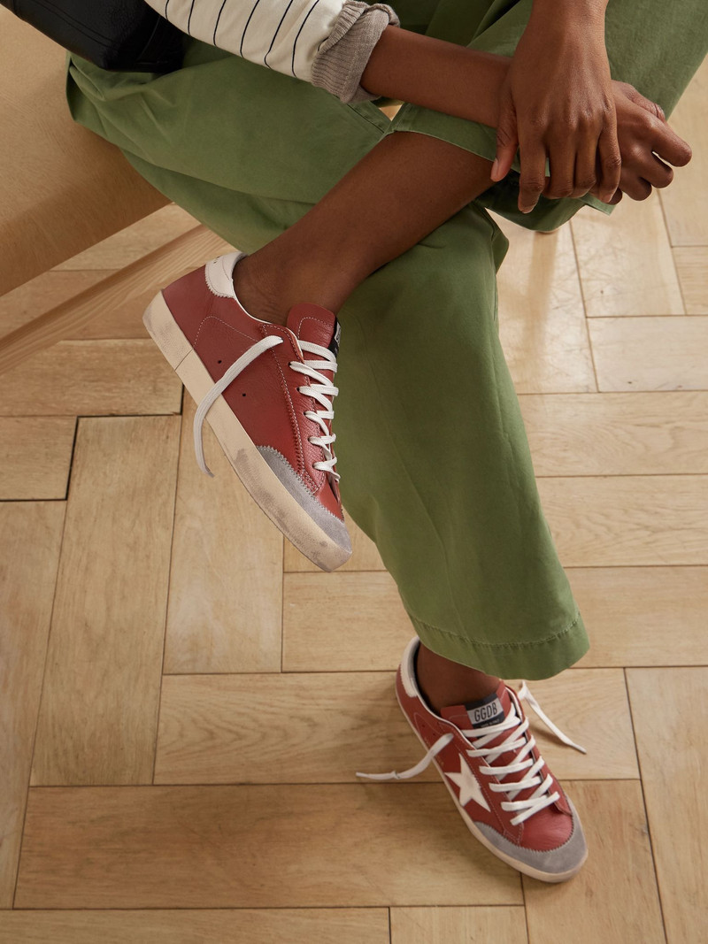 Golden Goose Super-Star distressed suede-trimmed leather sneakers Orange outlook