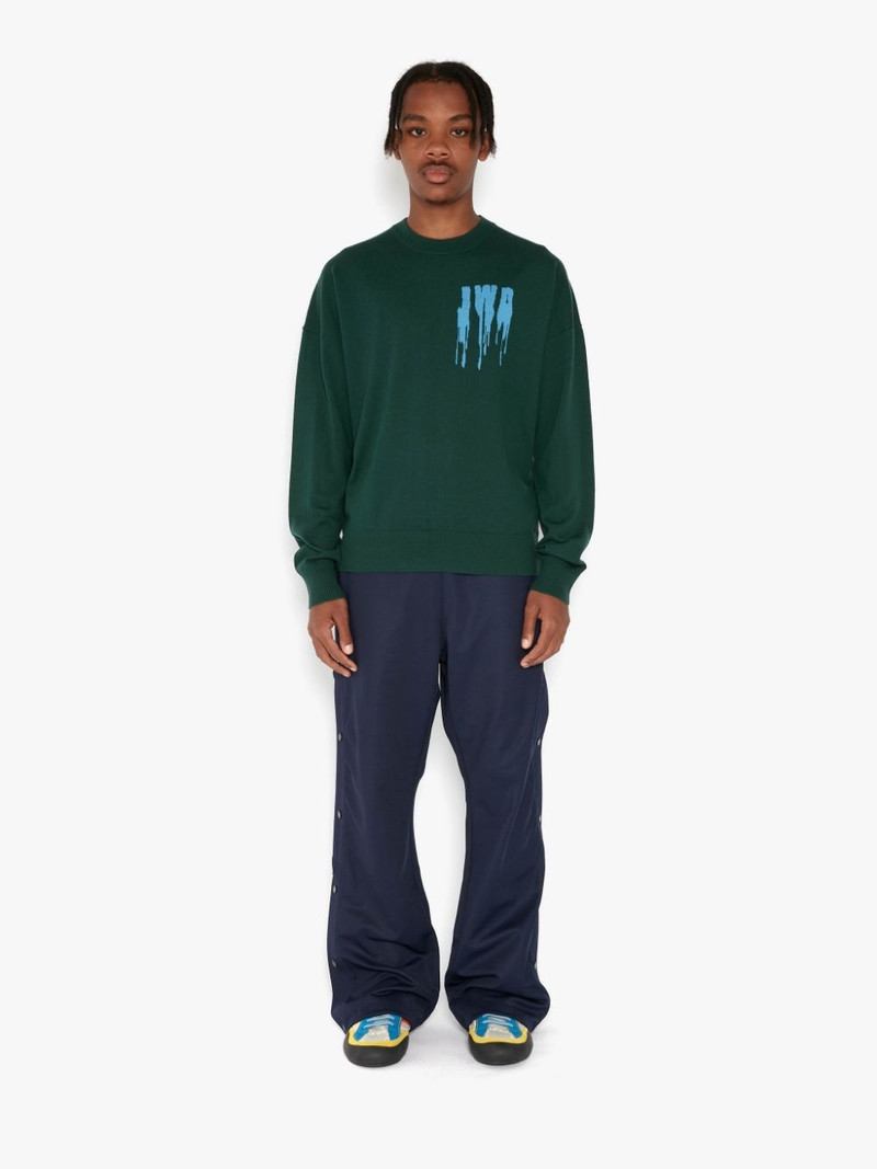 JW Anderson press-stud detailed bootcut trousers outlook