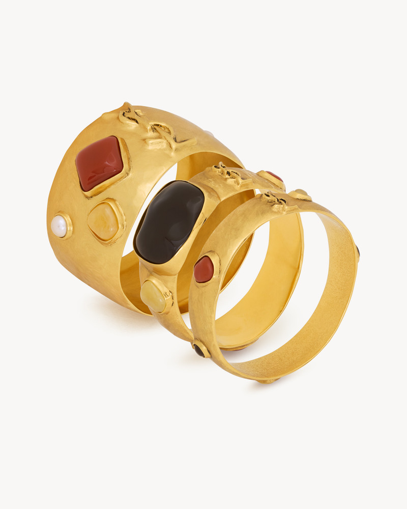 CASSANDRE CABOCHON BANGLES IN ENAMEL, RESIN, GLASS, AND METAL 1