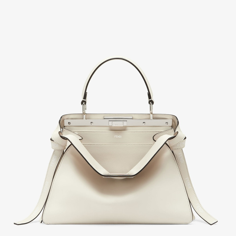 Iconic medium Peekaboo ISeeU bag, made of off-white leather with long knotted side laces, printed wi - 1