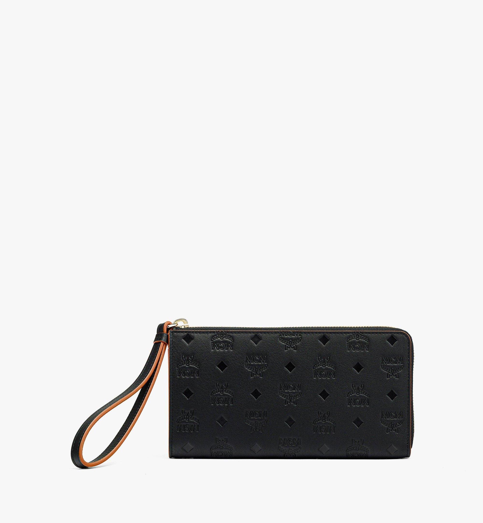 MCM Aren Chain Zip Around Wallet In Embossed Monogram Leather in Orange