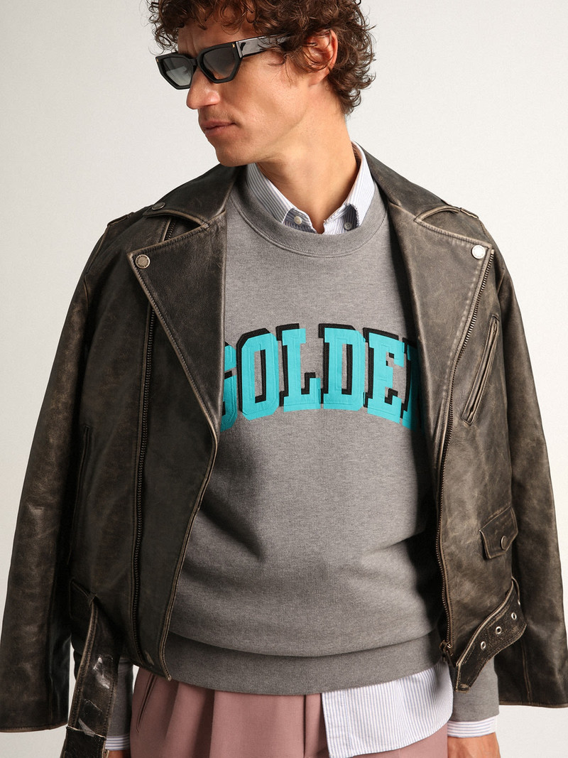 Gray Journey Collection sweatshirt with contrasting turquoise Golden lettering 2