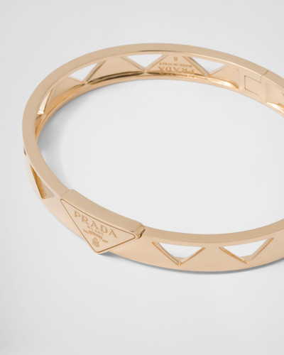 Prada Eternal Gold cut-out bangle bracelet in yellow gold outlook