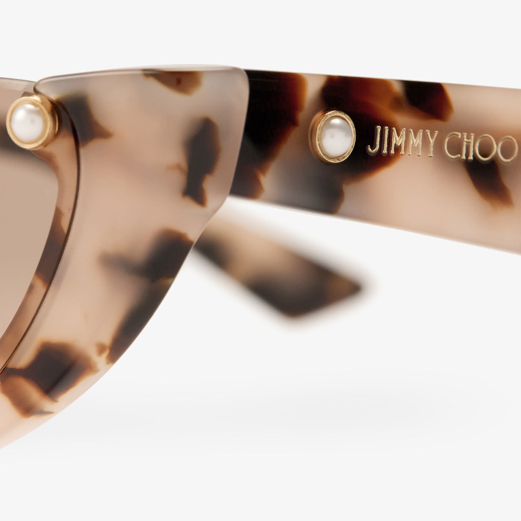 Beth
Pink Havana Cat Eye Sunglasses - 3