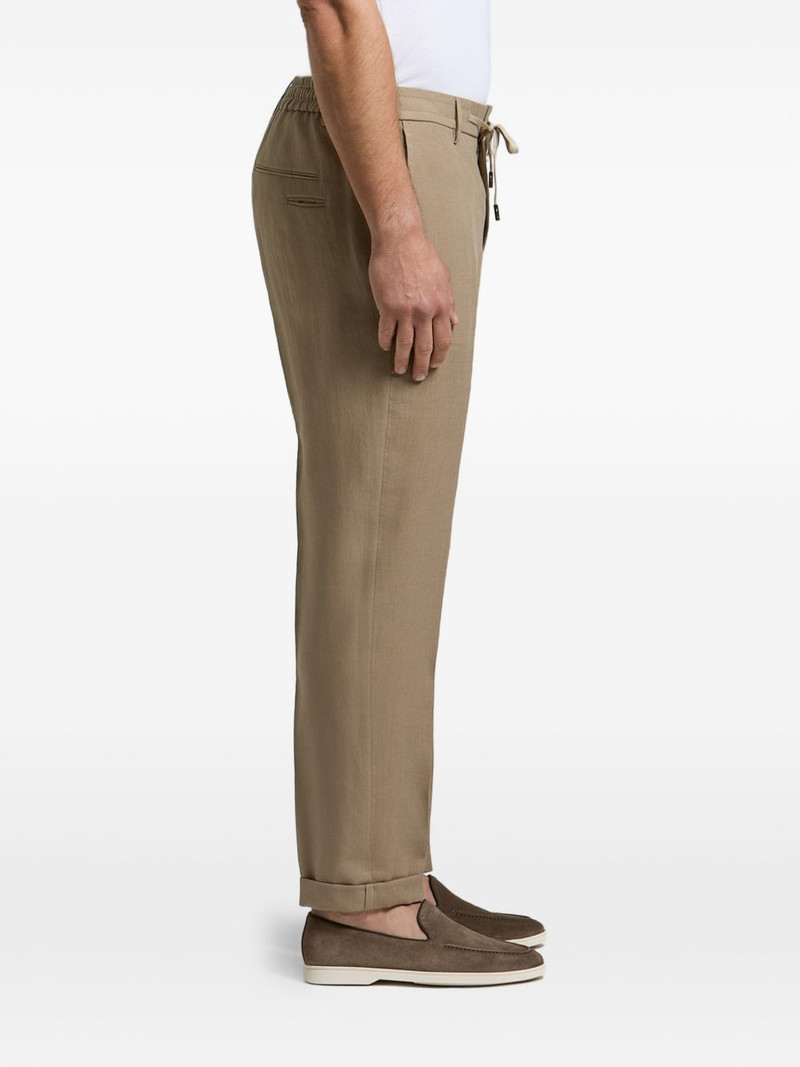 drawstring-waistband pressed-crease trousers 1