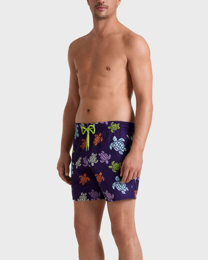 Vilebrequin MEN MICRO-PERFORATED ULTRA-LIGHT AND PACKABLE SWIM SHORTS TORTUES MULTICOLORES outlook